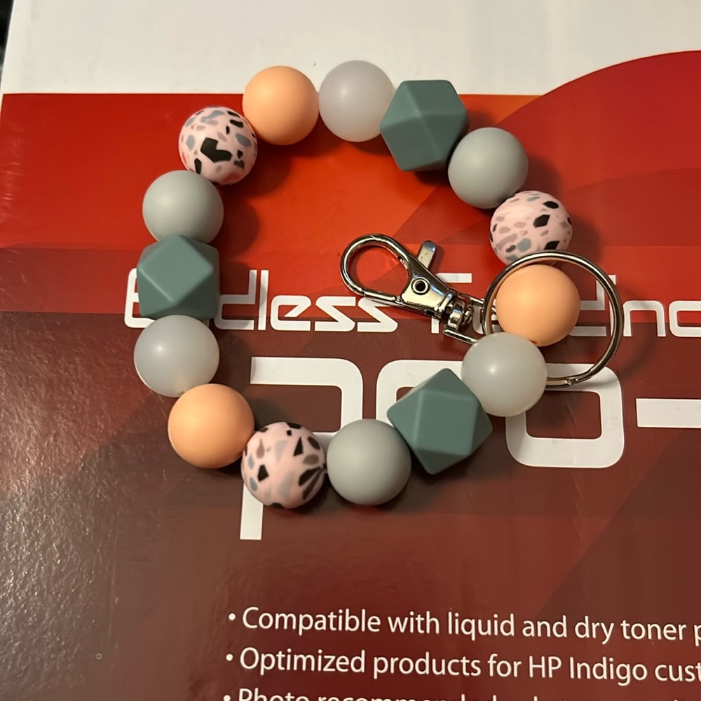 Silicone beaded wristlet with nylon string